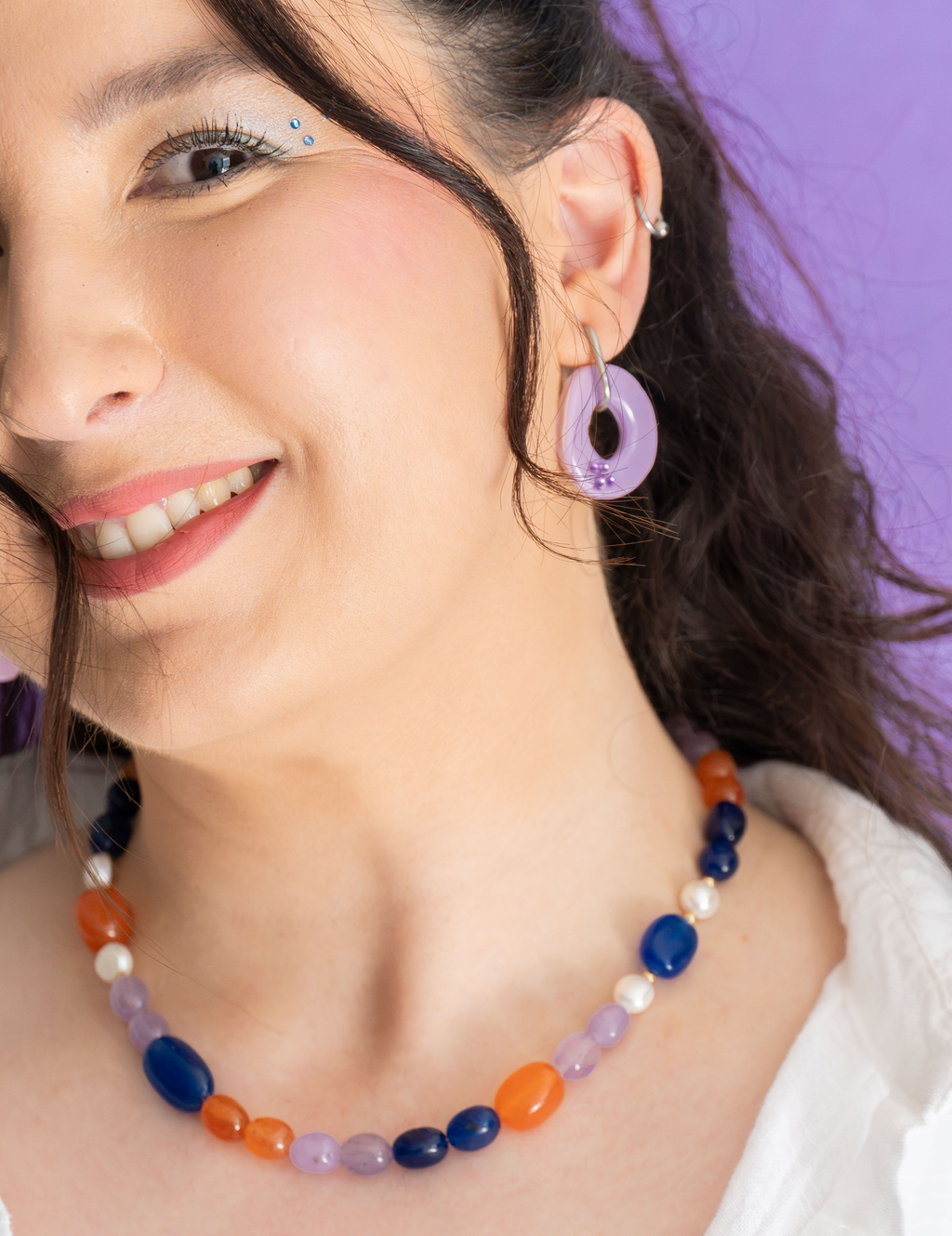 pendientes amuleto lila