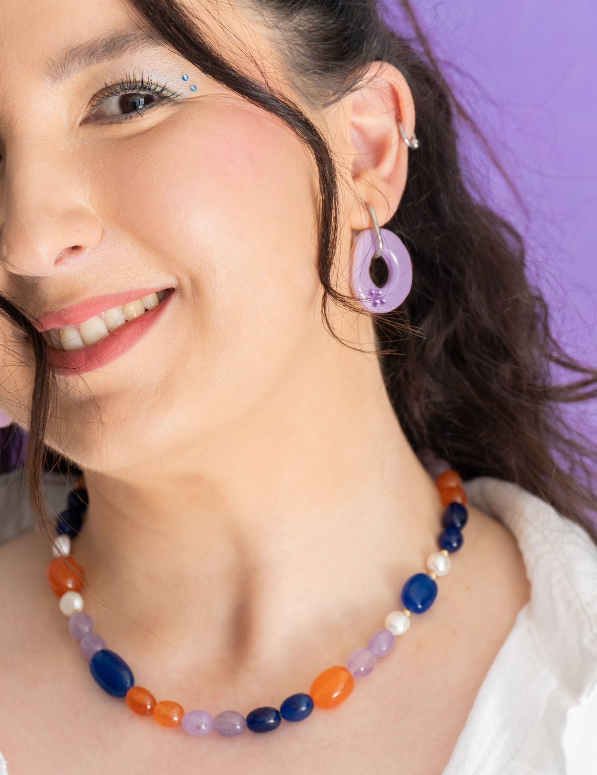 pendientes amuleto lila