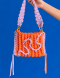 bolso brújula naranja