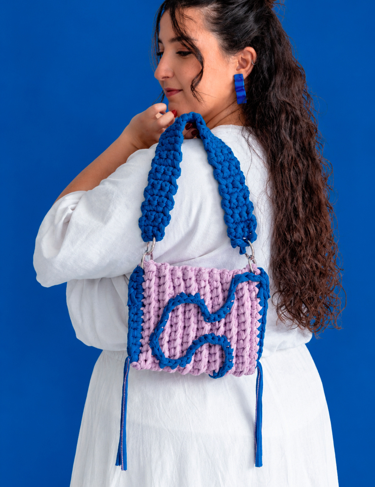 bolso brújula lila